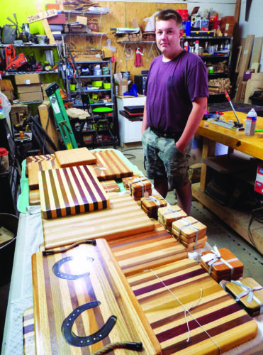 United High School student joins father in woodworking business